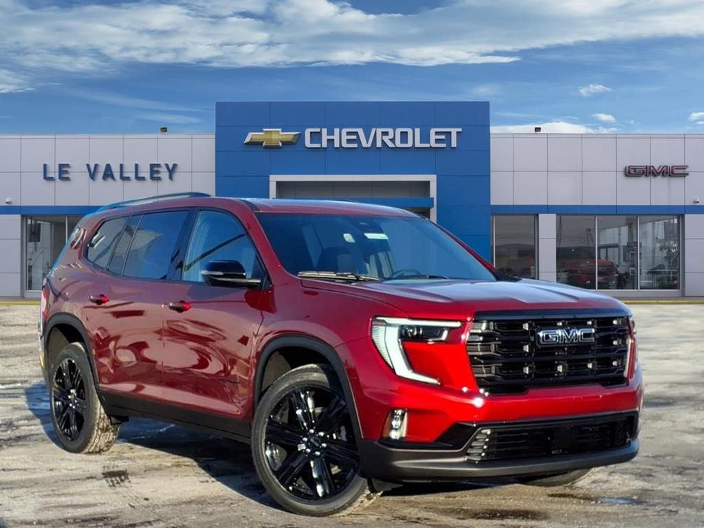 2026 GMC Acadia Elevation in Volcanic Red Tintcoat — front three-quarter view