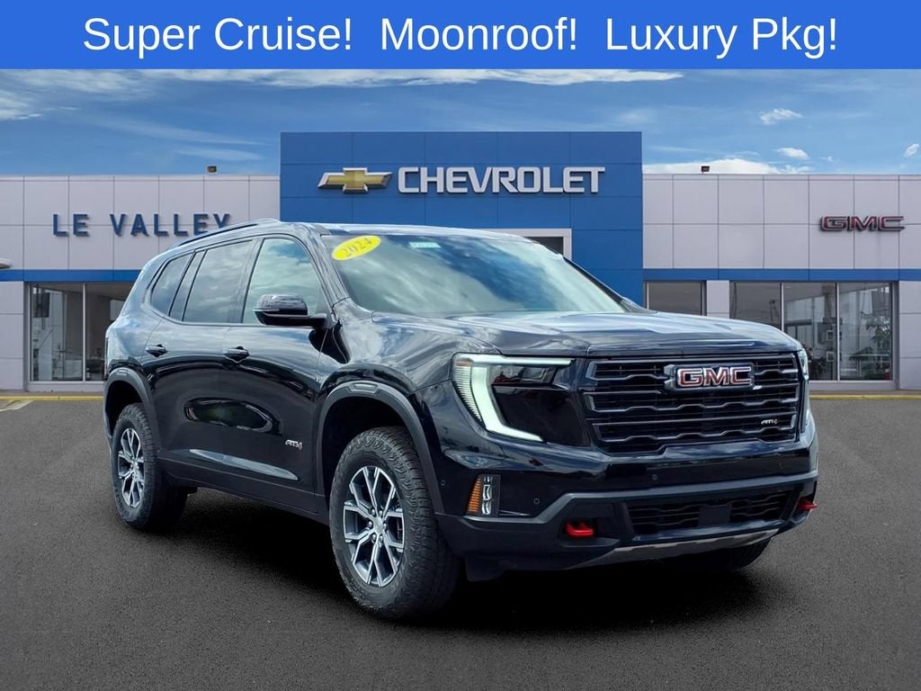 2024 GMC Acadia AT4 in Ebony Twilight Metallic — front three-quarter view