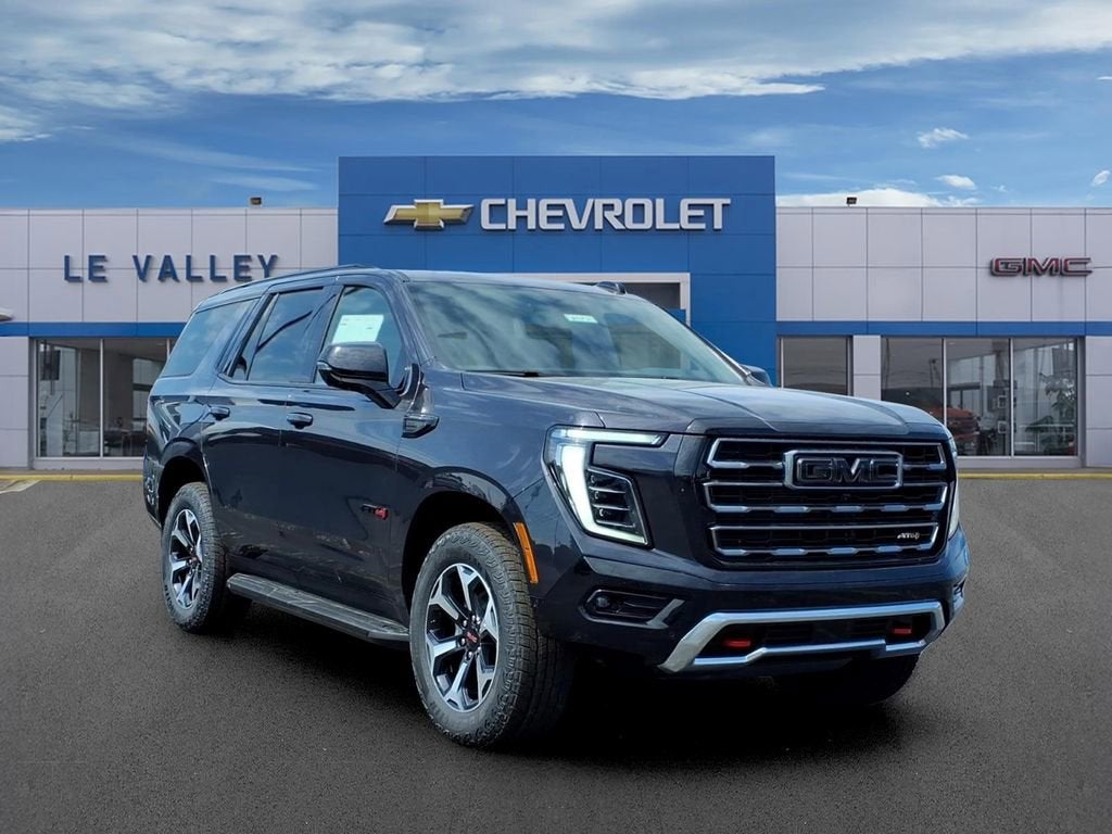 2026 GMC Yukon AT4 in Titanium Rush Metallic — front three-quarter view