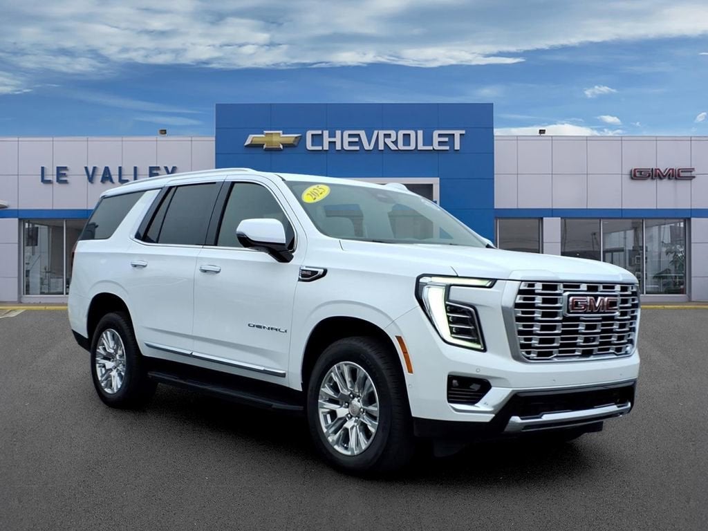 2025 GMC Yukon Denali in Summit White — front three-quarter view