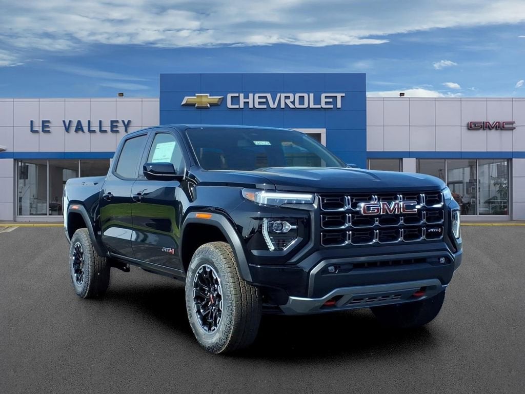 2026 GMC Canyon AT4 in Onyx Black — front three-quarter view