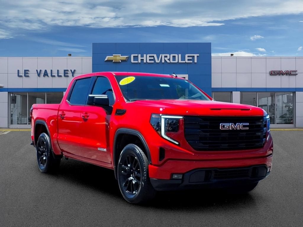 2024 GMC Sierra 1500 Elevation in Cardinal Red — front three-quarter view